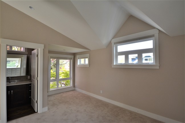 Bedroom looking into Master Bath - 7040 Alonzo Ave NW