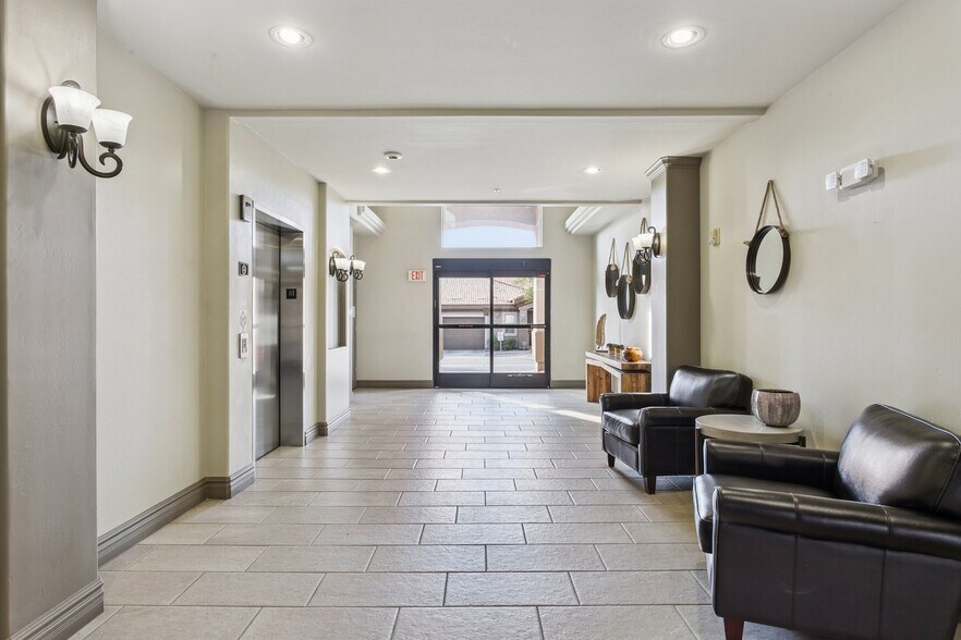 Welcoming lobby with elevator to the parking garage - 14000 N 94th St