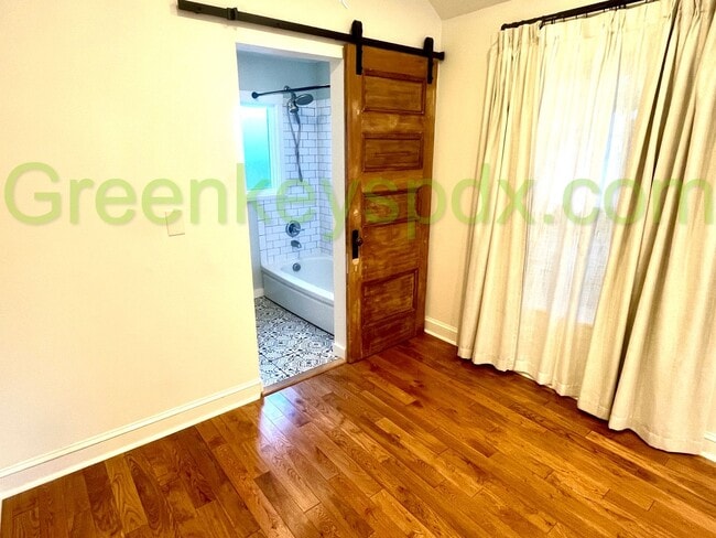 Building Photo - Sleek and modern 1-bedroom house in Arbor Lodge with spacious garage or workshop!