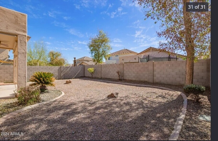 Building Photo - 45031 W Woody Rd