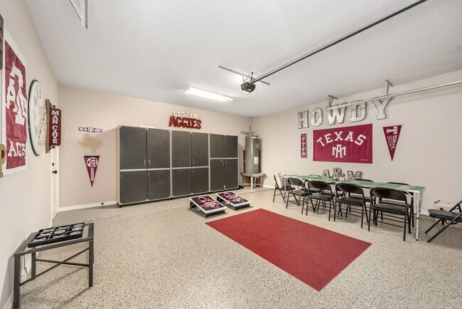 Building Photo - 4/4.5 Townhomes with Fenced Backyards!