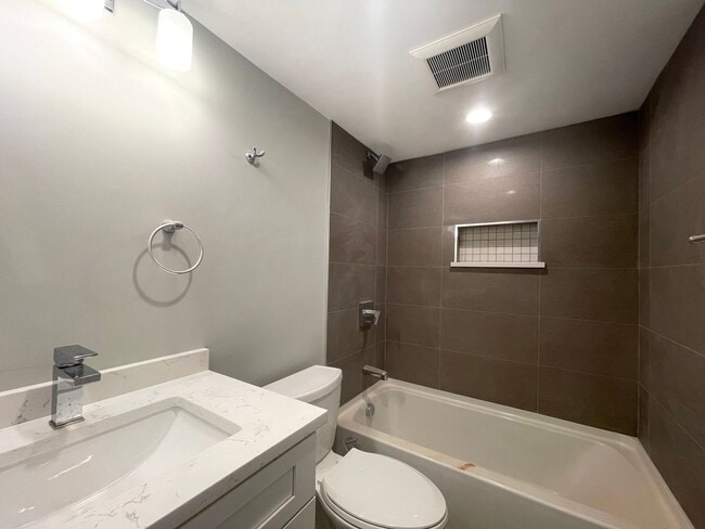 Building Photo - No Brokers Fee, Central Heat/AC, In Unit Washer and Dryer,  High-End Kitchen Appliances