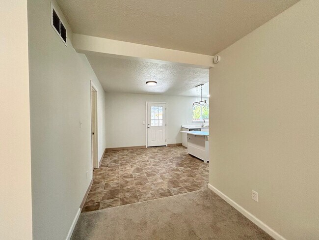 Building Photo - Freshly Updated 3 Bedroom Home with Garage, Fenced Yard & Covered Patio!