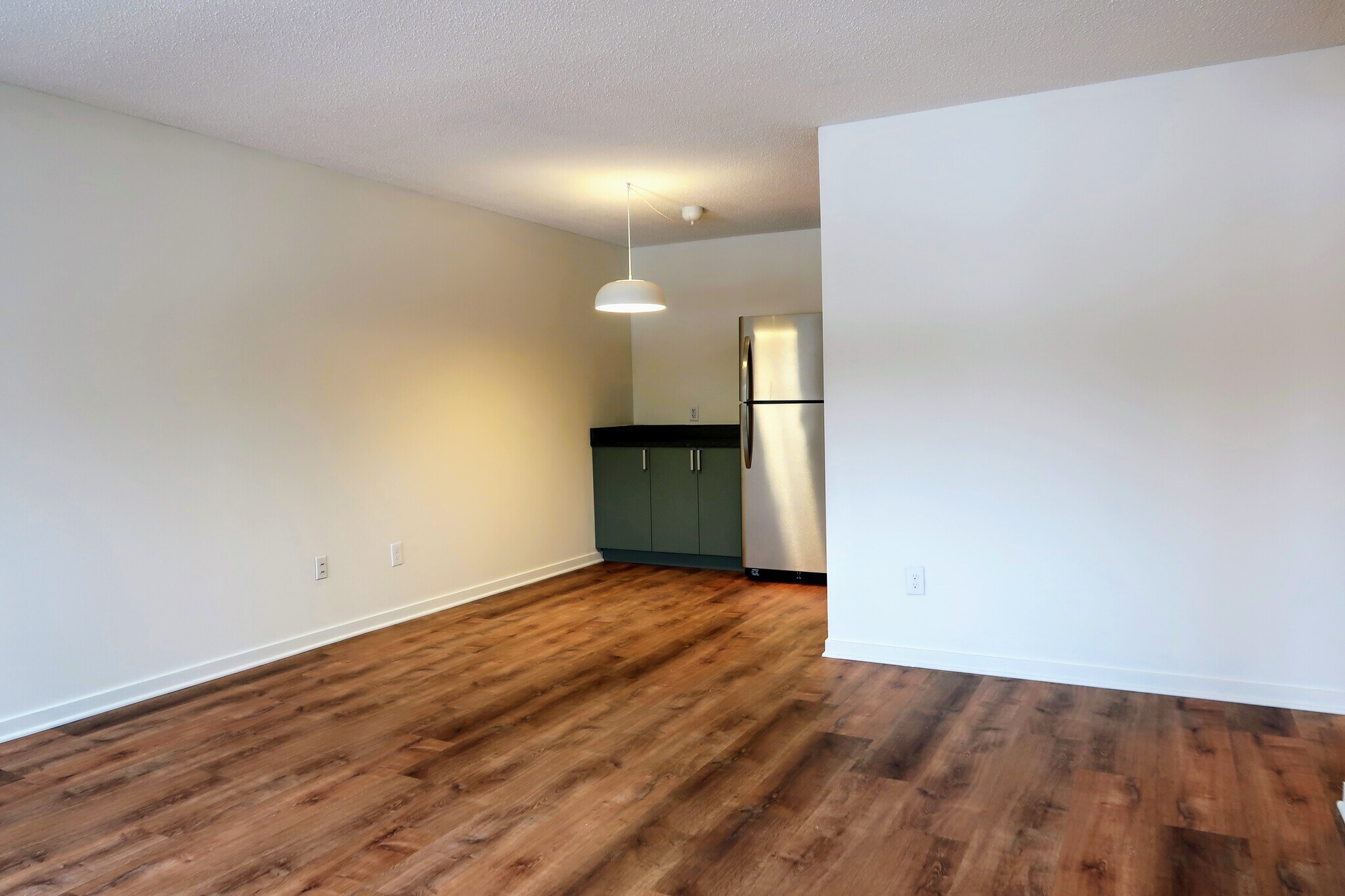 Living room to kitchen view - 2616 Harriet Ave S #203