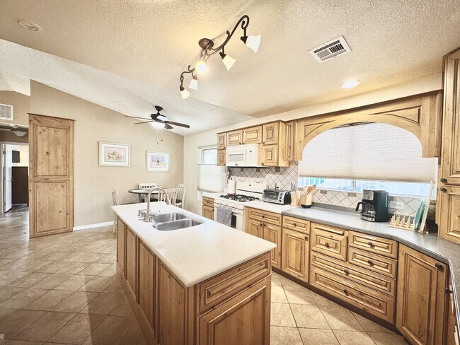 Building Photo - Fully Furnished Henderson Rental Near Cadence | 2 Bed Home w/ Solar + Backyard | Close to Cowabun...