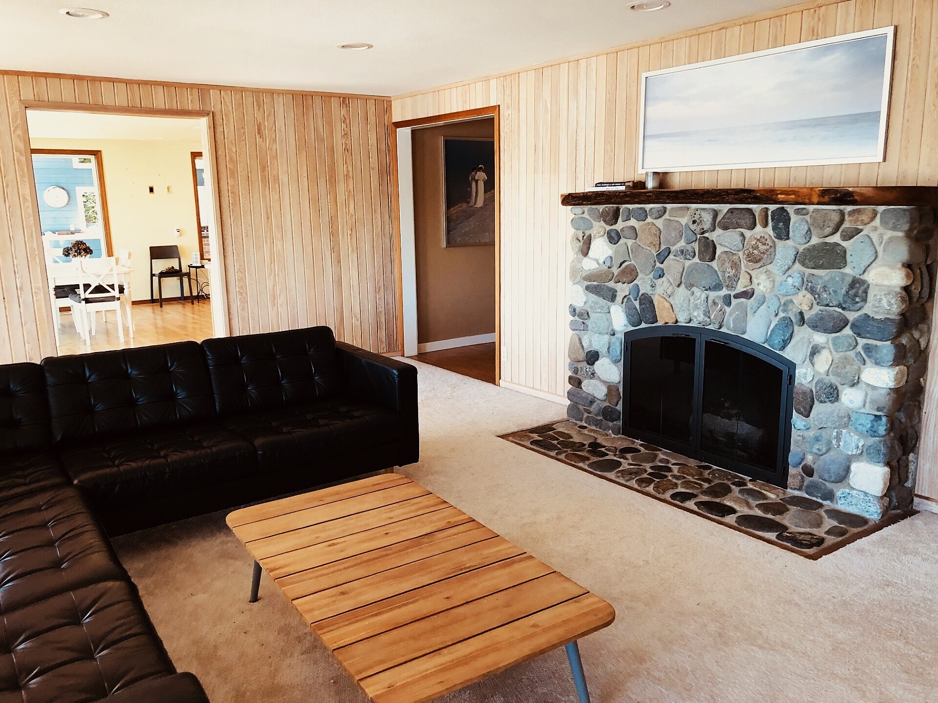 A stone fireplace, built by the original owners, converted to gas - 7107 120th St NW