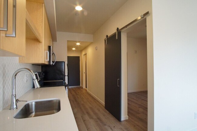 Building Photo - Modern & Chic Corner 1-Bed w/Private Balcony!