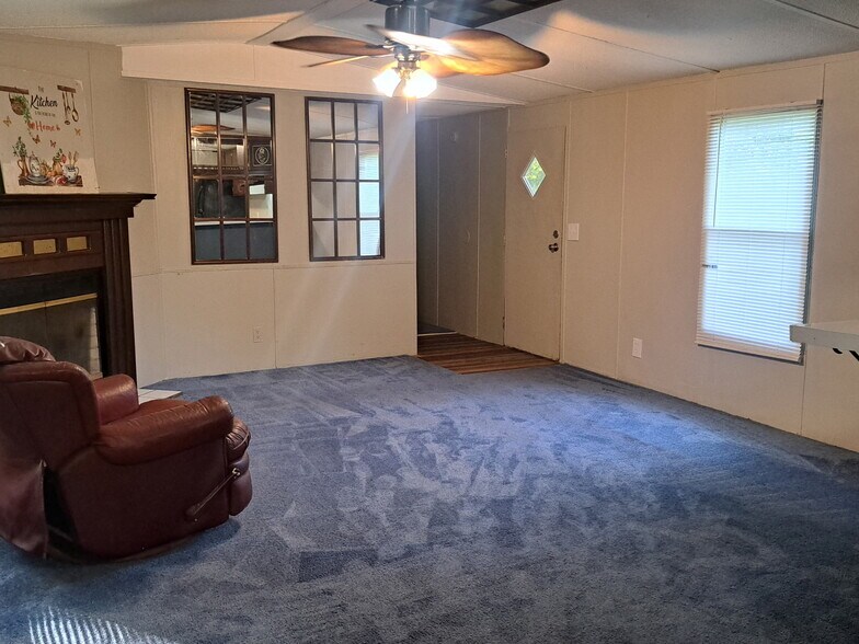 Living room with fireplace - 1908 Henry Ave