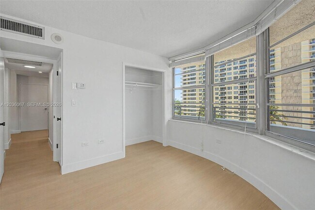 Building Photo - 5555 Collins Ave