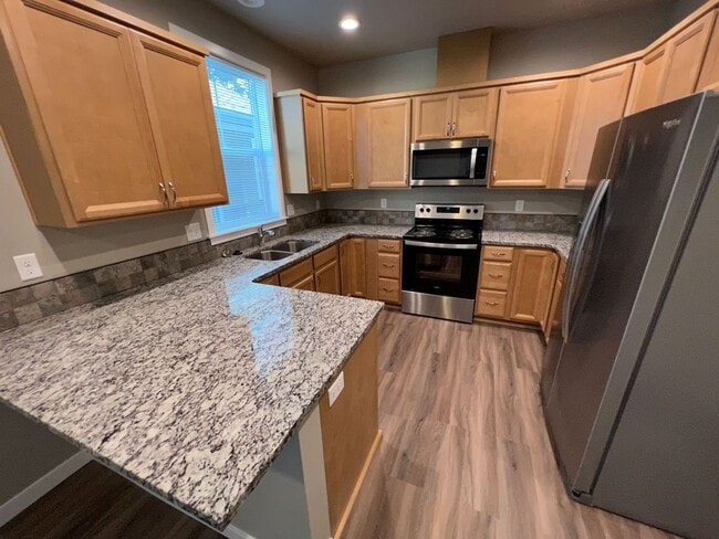 Building Photo - NEW 4 Bedroom / 4.5 Bath Townhome. A/C in every bedroom