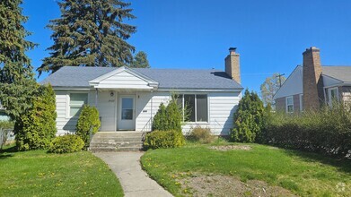 Building Photo - Great Shadle Home With Fenced Yard and Det...