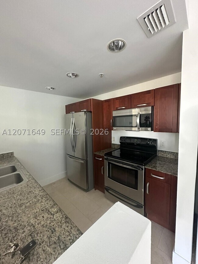 Building Photo - 7728 Collins Ave