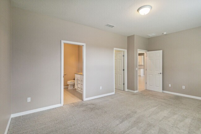 Building Photo - Gorgeous Energy Efficient 4/2 Home in Gated Community Close to Lake Nona