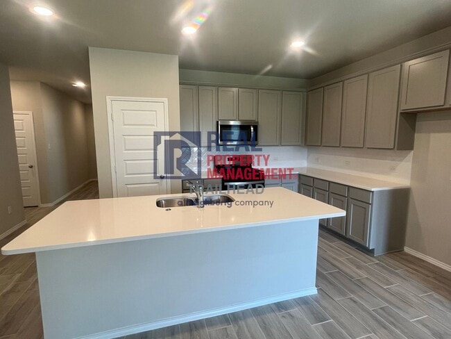 Building Photo - Striking 3 Bedroom/3 Bath Open Concept Hom...