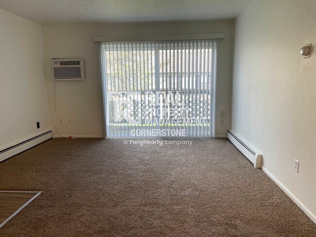 Building Photo - Bright 2-Bedroom with Private Deck & Heat ...