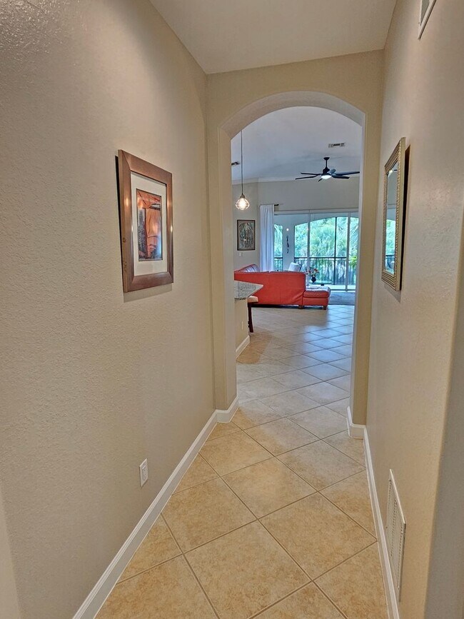 Building Photo - Annual Furnished or Unfurnished 3 Bedroom 2 Bathroom Second Floor Condo in Venetian Golf & River ...