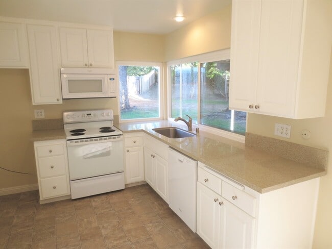 Building Photo - Updated Single Family Home with Over-sized...