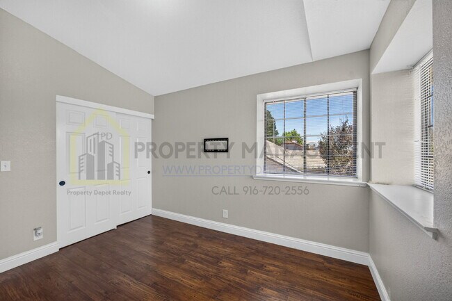 Building Photo - Spacious 4-Bedroom Retreat with 2.5 Baths