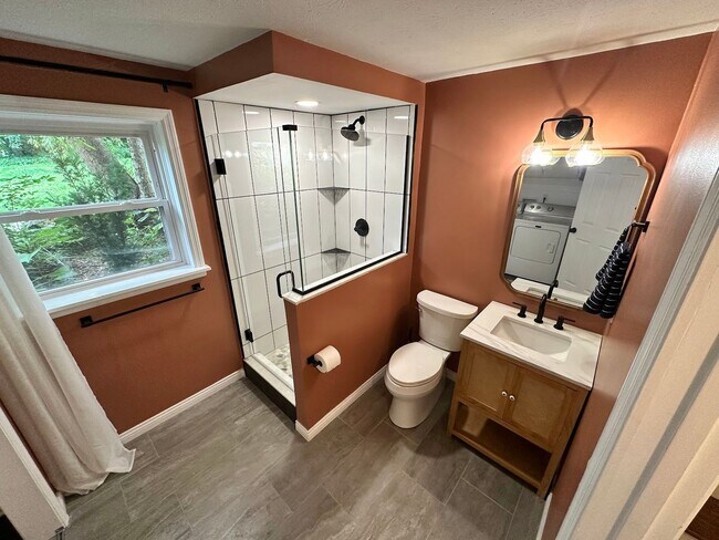 Building Photo - AVAILABLE NOW! Spacious 4 BR, 2 Bath House! Wood Floors, Attached Garage, W/D Included