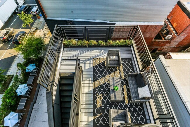 Building Photo - Private Double Decker Rooftop! - Modern Lu...