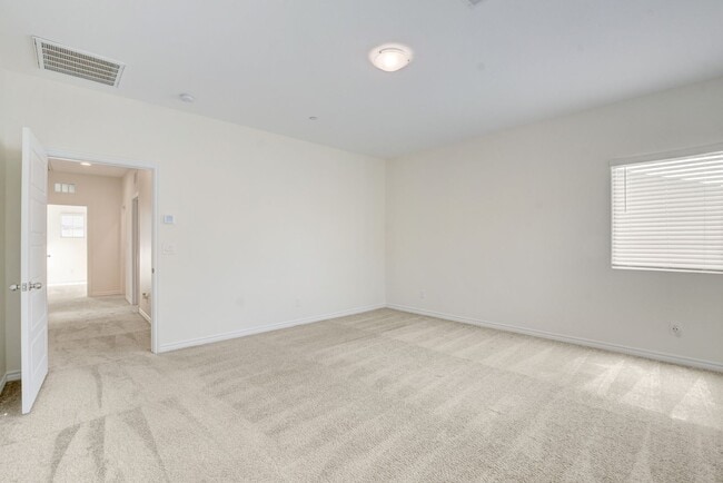 Building Photo - 4 Bedroom Townhouse in Tule Springs Coming Soon!