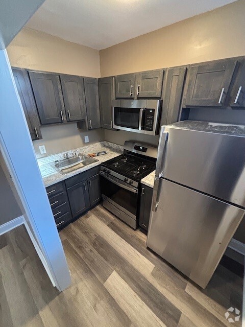 Renovated Kitchen - University Court Apartments