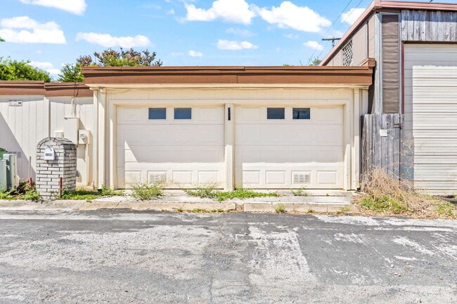 Building Photo - "Charming garden home offers 3-Bedroom Sanctuary with Cozy Fireplace in San Antonio – 1710 Sq Ft ...