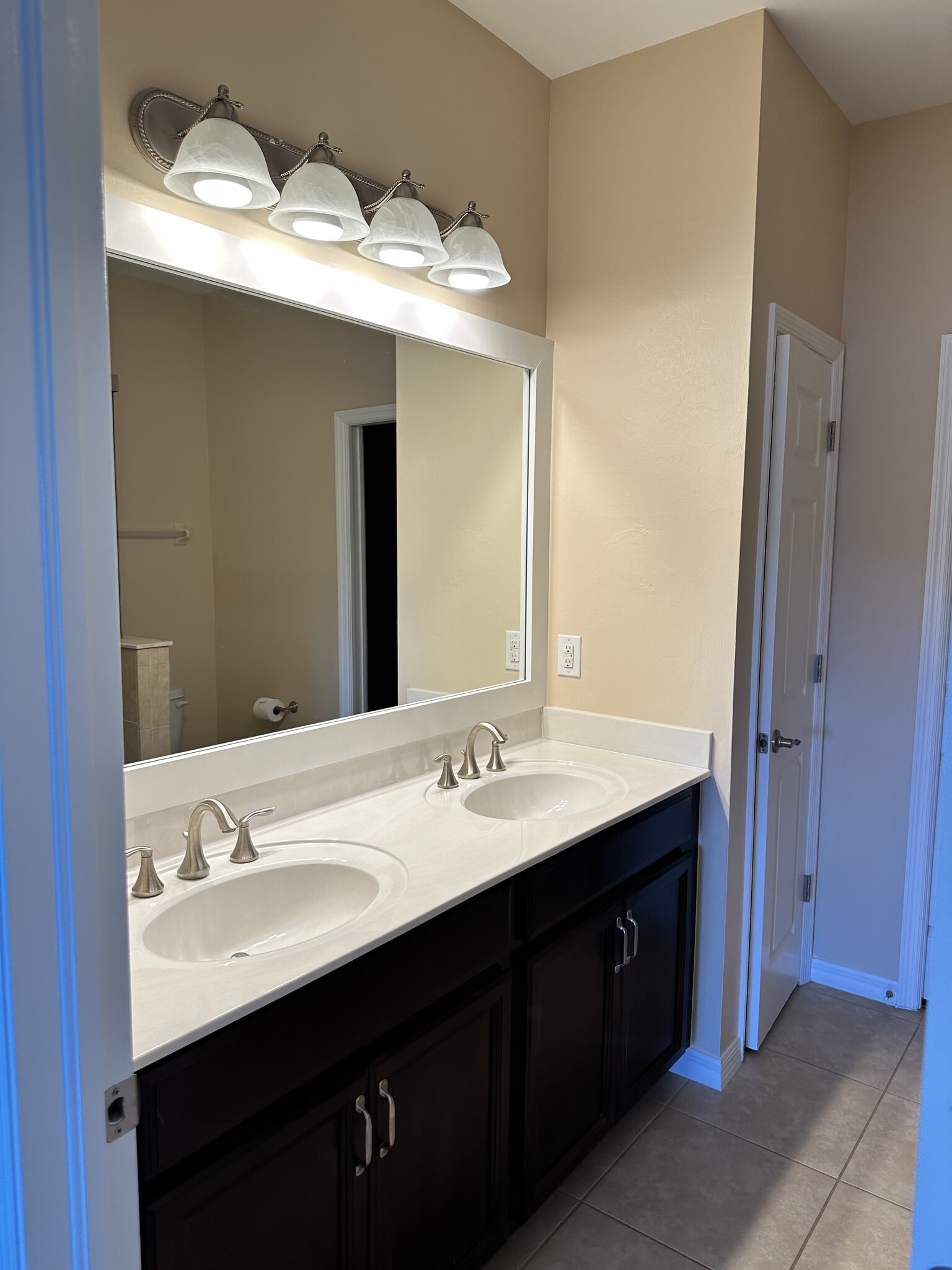 Primary bathroom with dual sinks and shower - 127 Explorer Dr