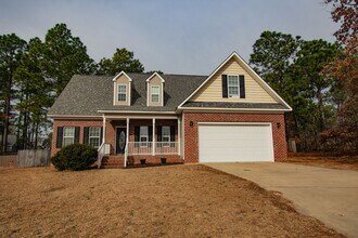 Building Photo - 4 Bedroom 2.5 Bathroom With Bonus and Screened in Porch!