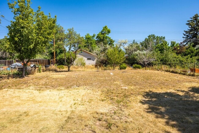 Building Photo - Updated and Bright Home with Yard