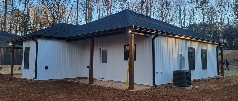 Covered back porch of 1 bedroom duplex unit - 1908 Charles Raper Jonas Hwy