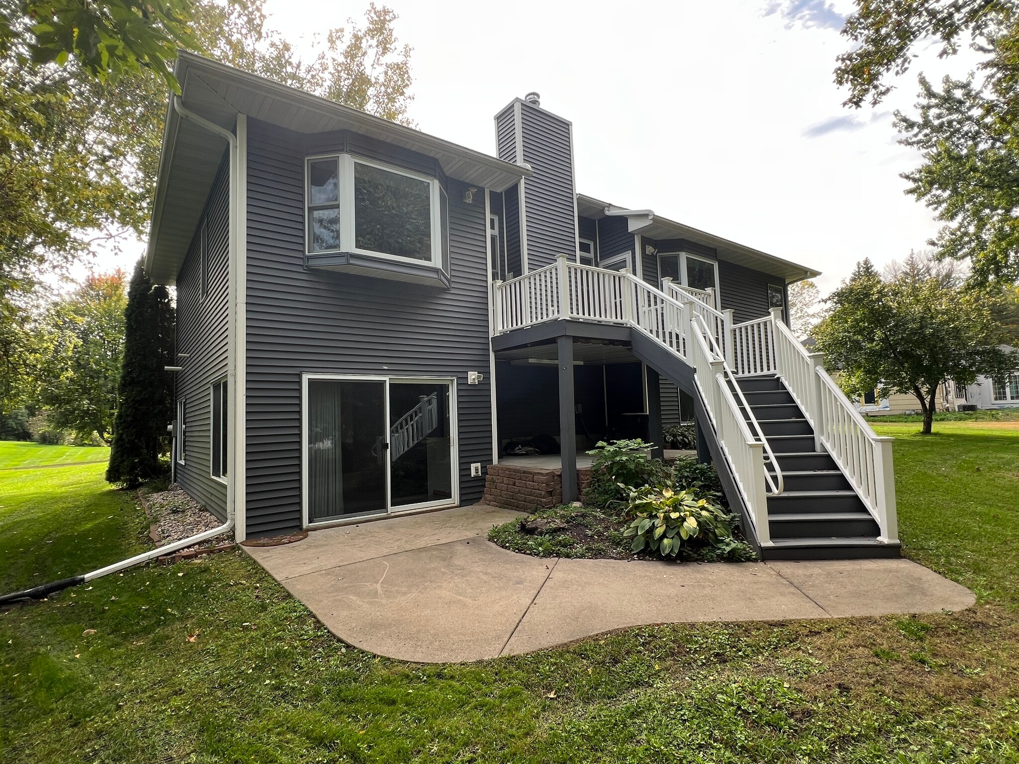 Back Patio and stairs - 118 S Shannon Dr