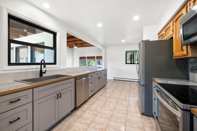 Building Photo - NEW MOVE-IN SPECIAL! Vibrant Home Off Rode...