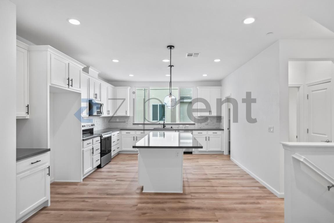 Building Photo - 6165 Raven Ave