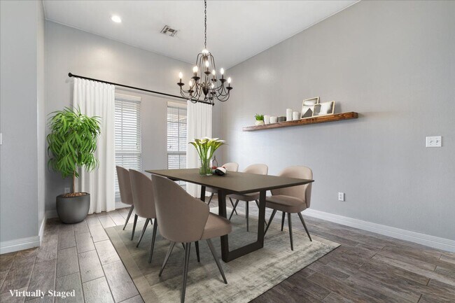 Building Photo - Discover this spacious 4-bedroom, 2-bath home