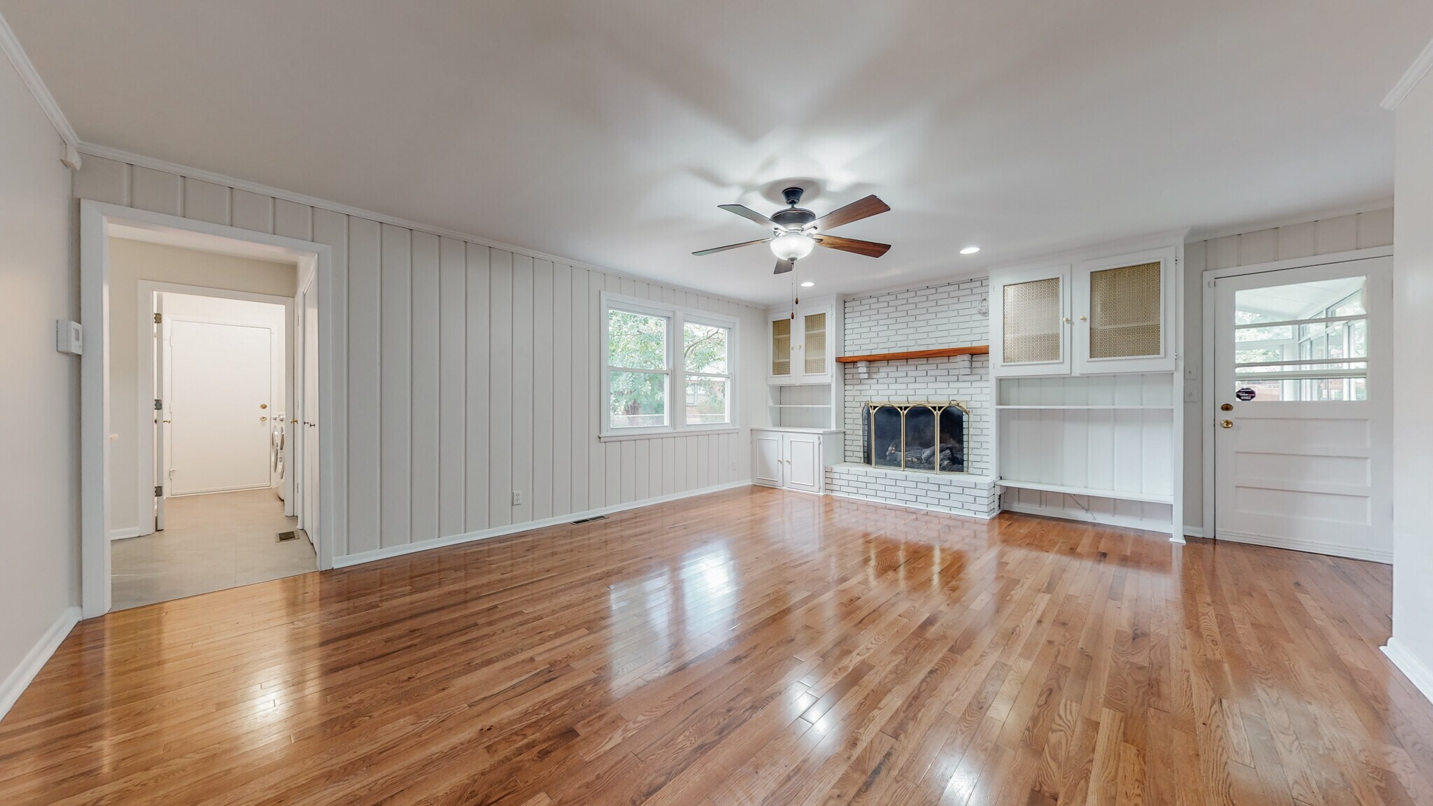 Den showing entry to kitchen and laundry - 203 Donelson Hills Dr