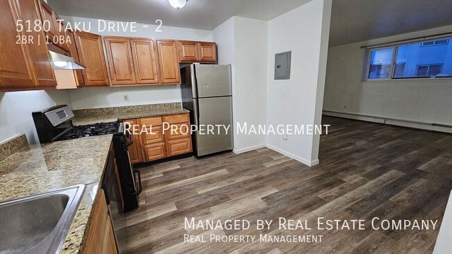 Building Photo - Two Bedroom One Bath Apartment Four Minute...