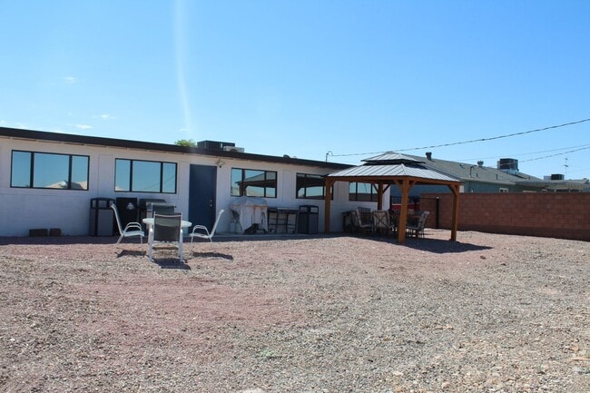 Building Photo - Long Term Rental! Available Unfurnished OR...