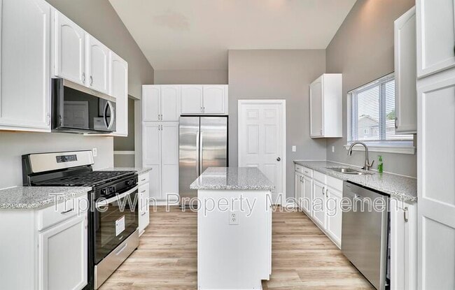 Building Photo - 4927 Triple Tree Ct