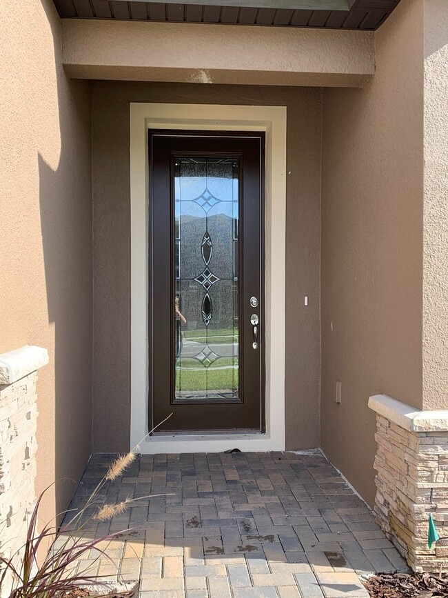 Building Photo - Gorgeous Energy Efficient 4/2 Home in Gated Community Close to Lake Nona