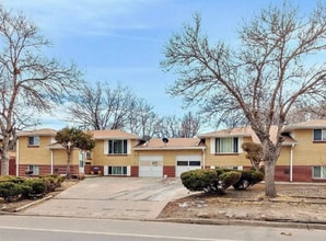 Building Photo - 7360 W.20th Ave. Unit B