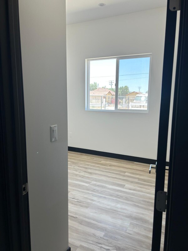Building Photo - 9208 E Ave T 6