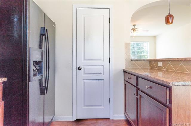 Building Photo - "Charming 3-Bed Oasis with Granite Accents & Pool Retreat in Belmont!"