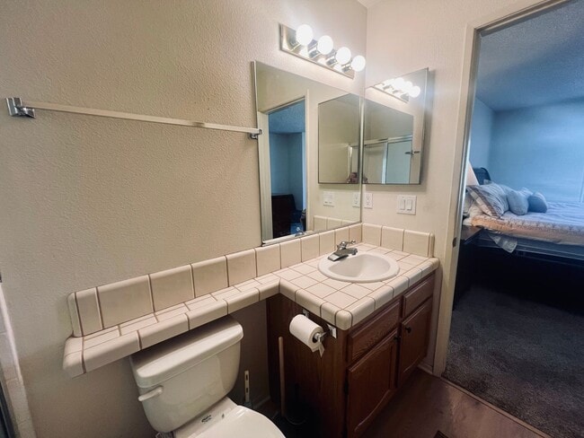 Building Photo - Affordable Comfort in 55+ Guard-Gated Comm...