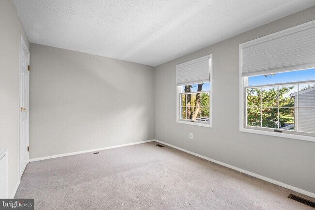 Building Photo - 7807 Breezy Down Terrace