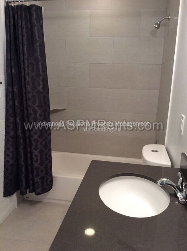 Building Photo - 619 E 5th Ave