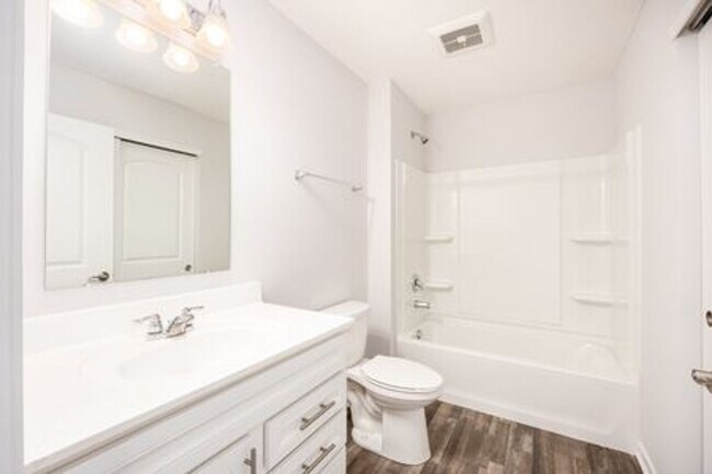 Building Photo - Updated 3-Bedroom Home with 3 Baths, Open-Concept Layout, Luxury Flooring & Bright Modern Kitchen