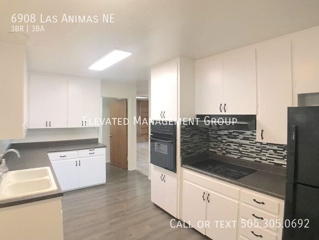 Building Photo - 6908 Las Animas Ave NE