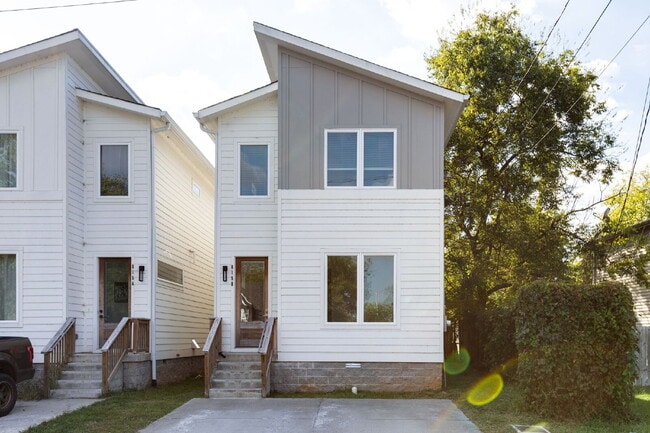 Building Photo - "Charming 4-Bedroom Nashville Oasis with Elegant Hardwood Floors & Private Guest Suite!"