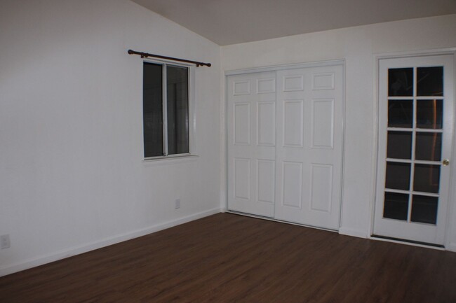 Building Photo - $250 OFF! Charming Two-Story Condo in Palm...